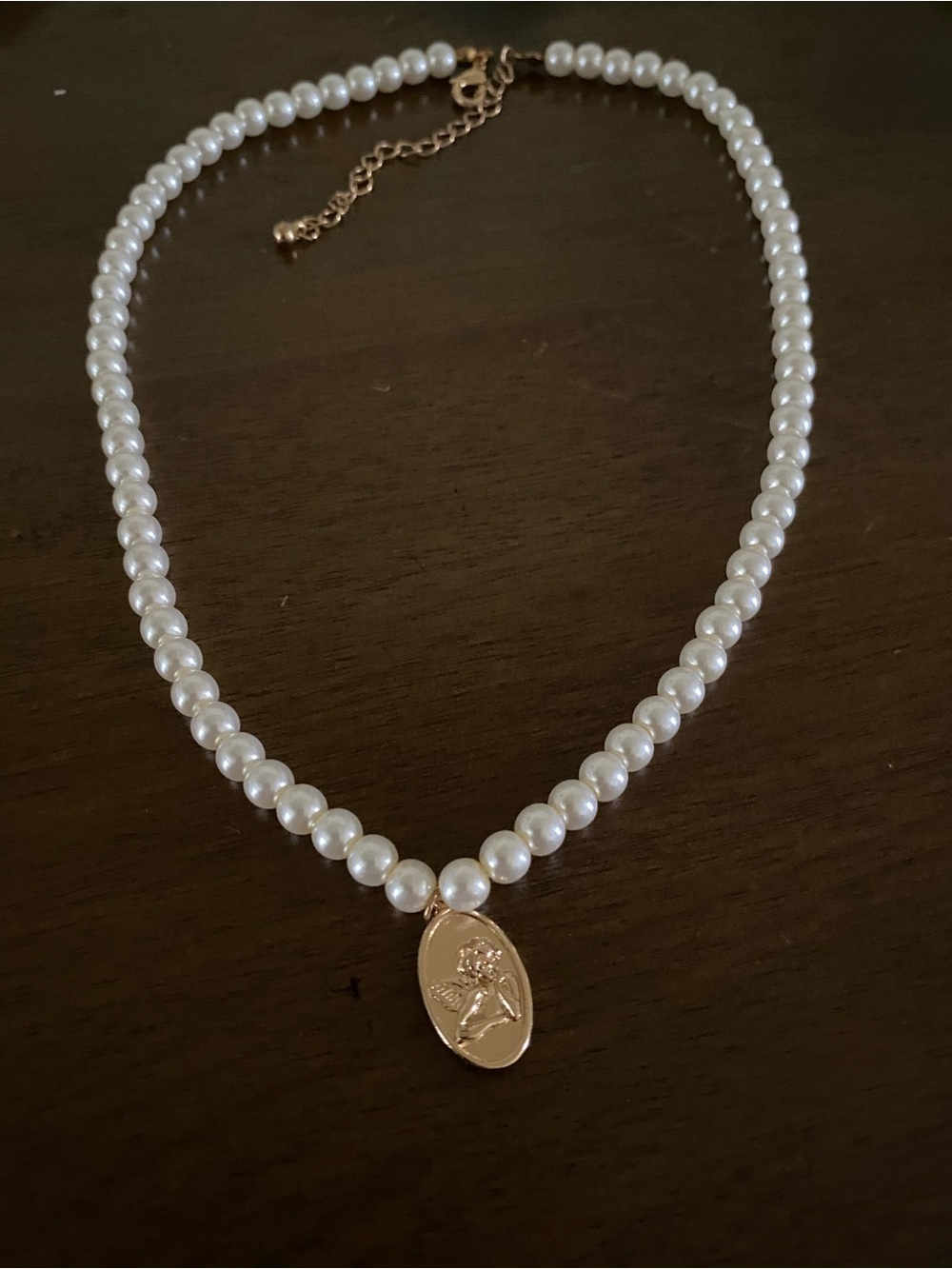 Pearl Beaded Necklace with Gold Cherub Medallion